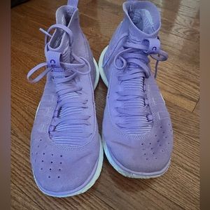 Curry brand-  size 8.5 men’s basketball sneaker-  NEVER WORN!